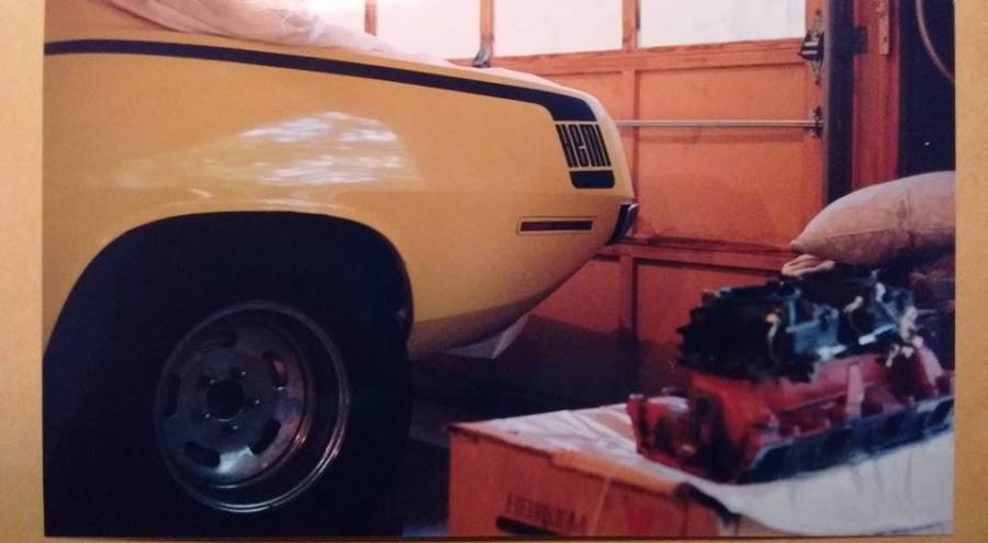 Attached picture 1970 Hemicuda with factory paint and stock intake to the right   picture from 2000..jpg